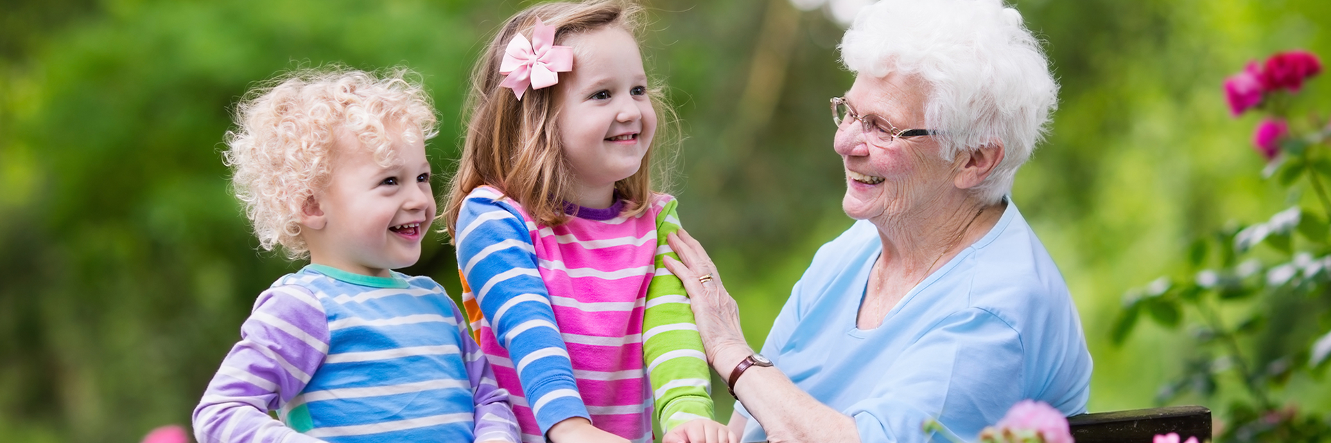 Happy Grandmother outside with grandkids